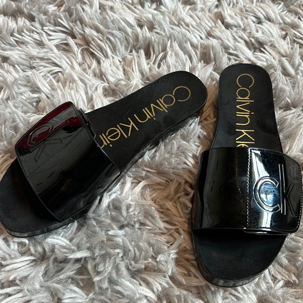 Calvin Klein black slides, size 7